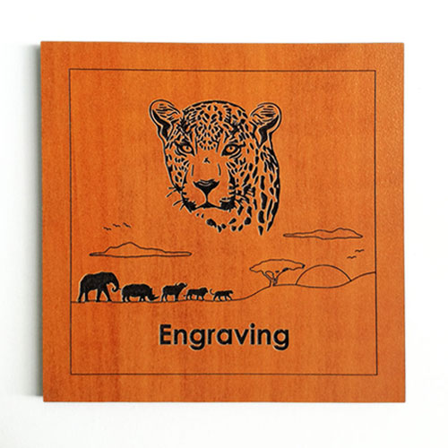 Engraved wooden coaster with leopard and wildlife backdrop – custom safari-themed décor