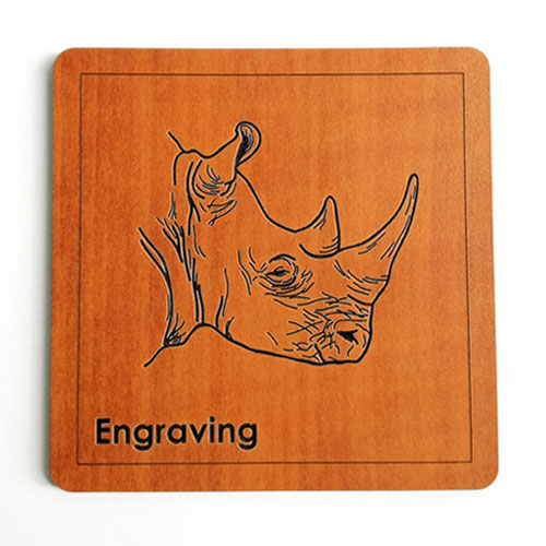 Engraved rhino wooden coaster with bold linework – handcrafted Big 5 safari gift