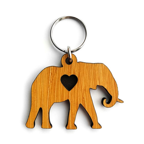 Custom keyring in elephant shape with heart cutout – personalised wooden accessory crafted for animal lovers
