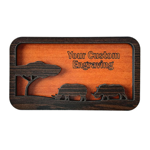 Personalised fridge magnet with rhinos under a tree – engraved wildlife design on dark wood background