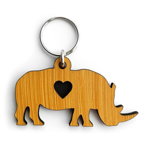 Custom keyring shaped like a rhino with heart cutout – a layered wooden personalised keyring for nature lovers