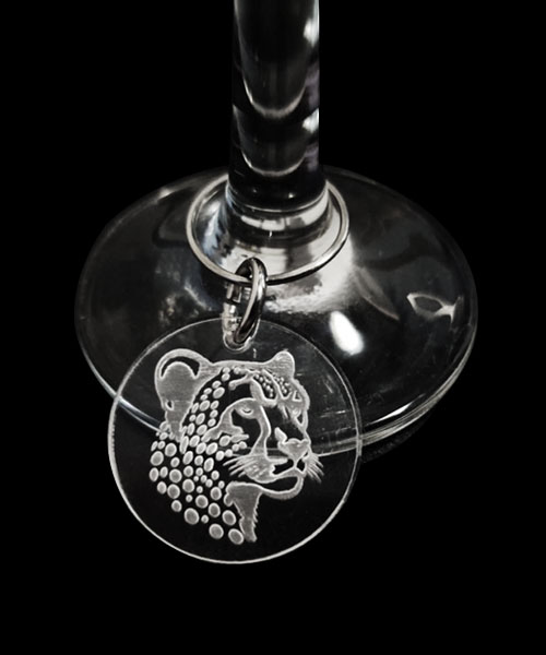 Acrylic wine glass charm featuring an engraved leopard design – custom wine glass accessory by Wildcrafts